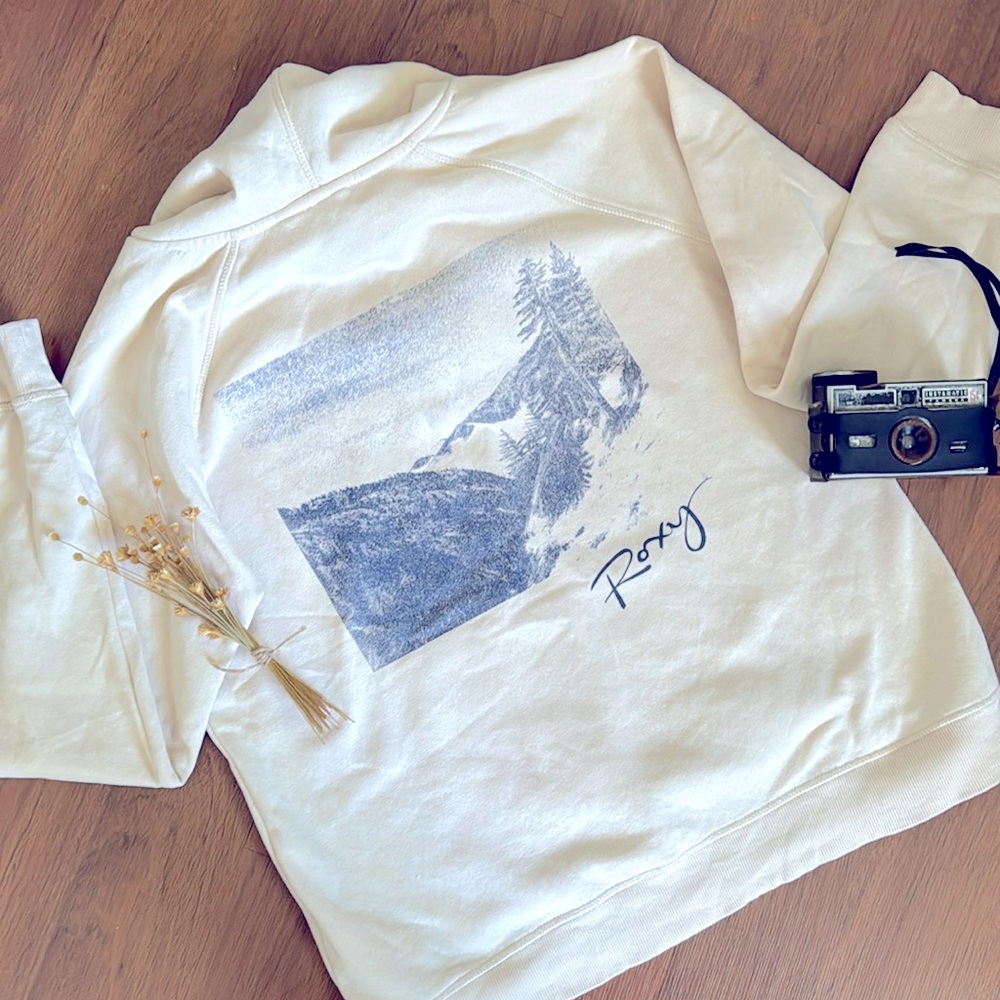 Roxy Small Cream Hoodie with Blue Mountain Scene on the Back